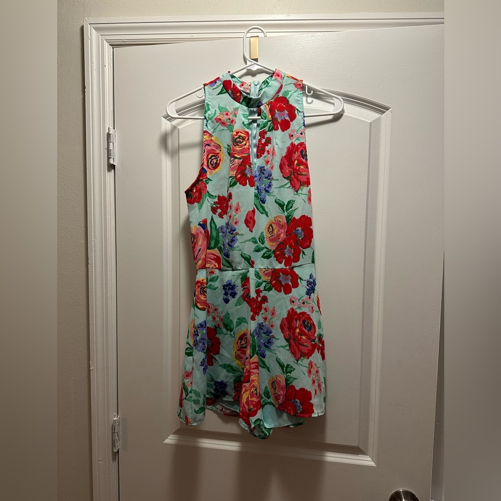 Adorable floral print romper. Size small high neck from local boutique